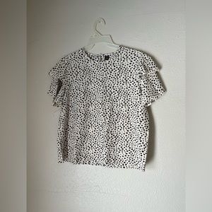 Women’s flowy blouse with black and white animal, print with ruffle sleeve